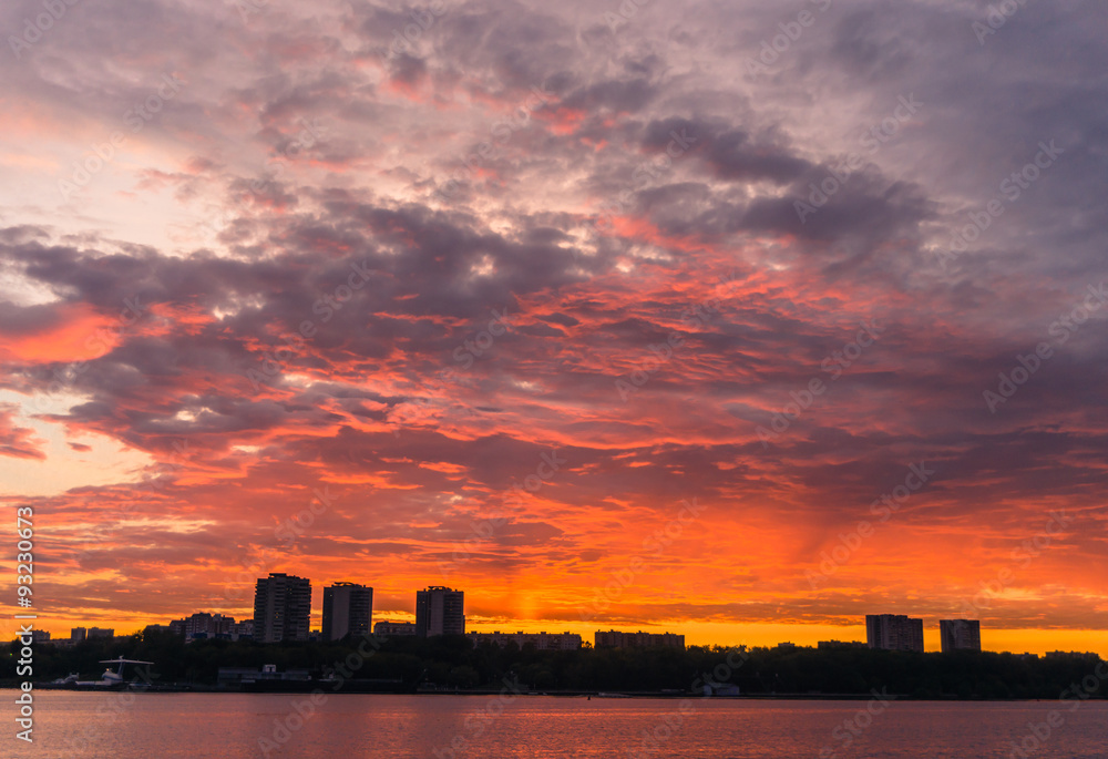 dramatic evening sunset of Moscow skyline across the Volga River 