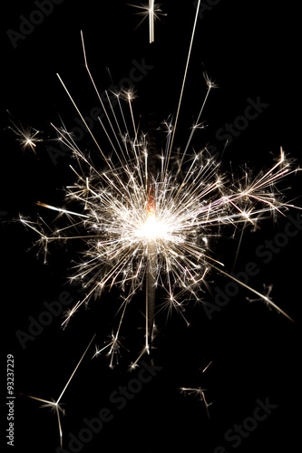 Celebrate party sparkler little fireworks on black background. Use for Christmas and New year and other celebration.