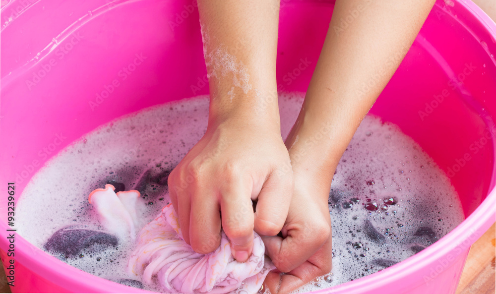 Fototapeta premium Hand washing clothes