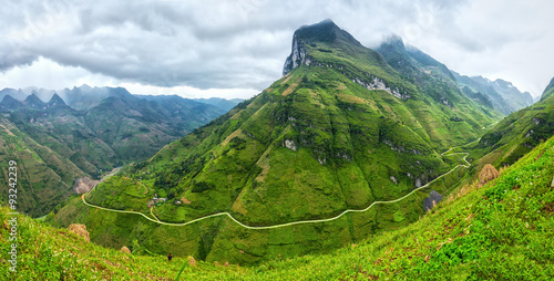 Unique bow Ma Pi Leng Pass, Ha Giang, Vietnam with clouds majestic mountains all year round attracting your soul to behold