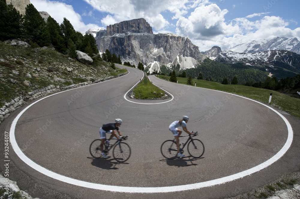 Fototapeta premium Rock the asphalt road cyclists