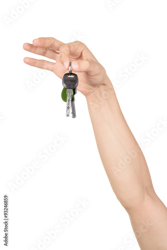 hand holding key isolated on white