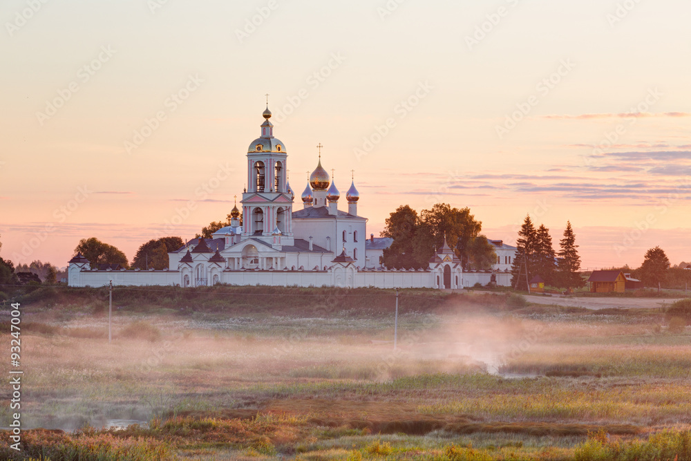 Village Pogost-Krest. Monastery of the Lord's Life-giving Cross at sunrise