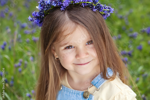 Happy little girl in nature  photo