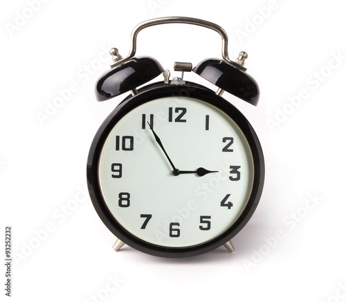 Iconic alarm clock isolated on white