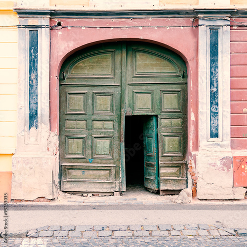 Doorway in a vintage gate  Open doorway in a vintage gate in Transylvania, Romania. © hipgnosis