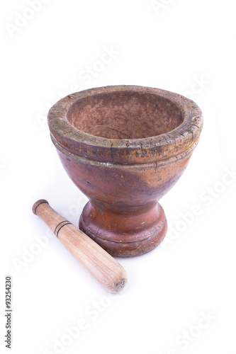 wooden mortar and pestle isolated on white background