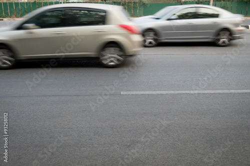 car fast motion blurred driving on road © sutichak