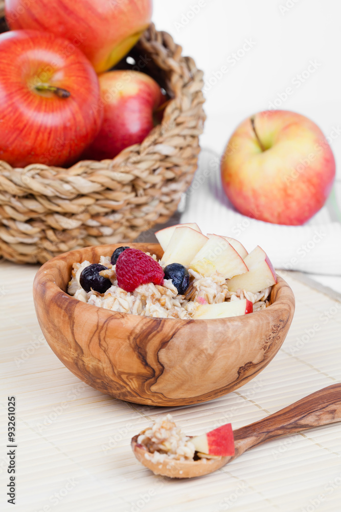 Healthy bowl of muesli, apple, fruit and milk for a nutritious b Healthy bowl of muesli, apple, fruit and milk for a nutritious b