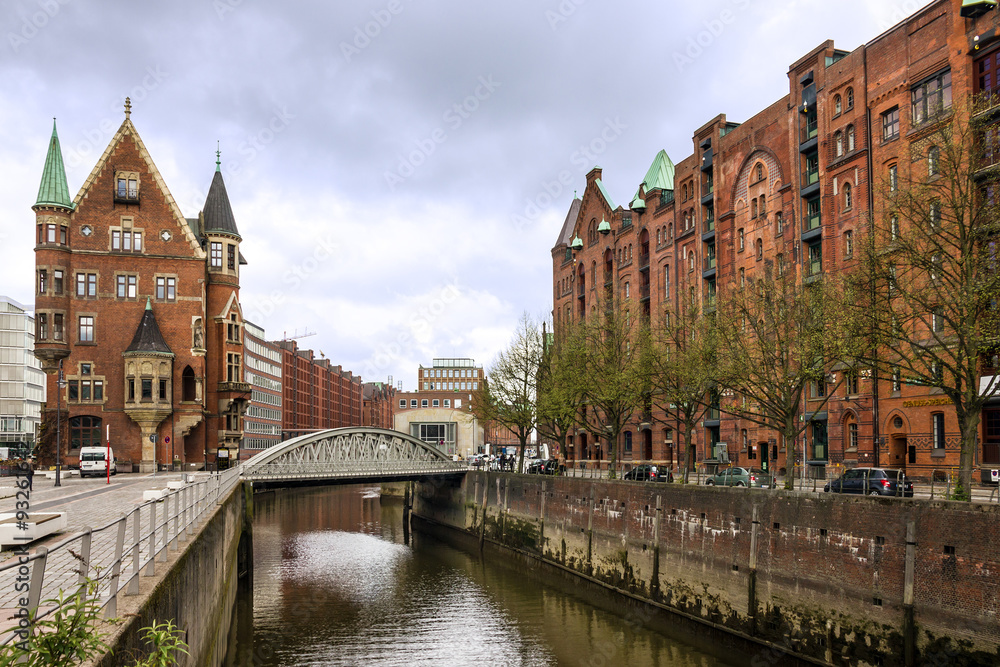 Naklejka premium Hamburg, Germany. Canal waterfront. Old buildings