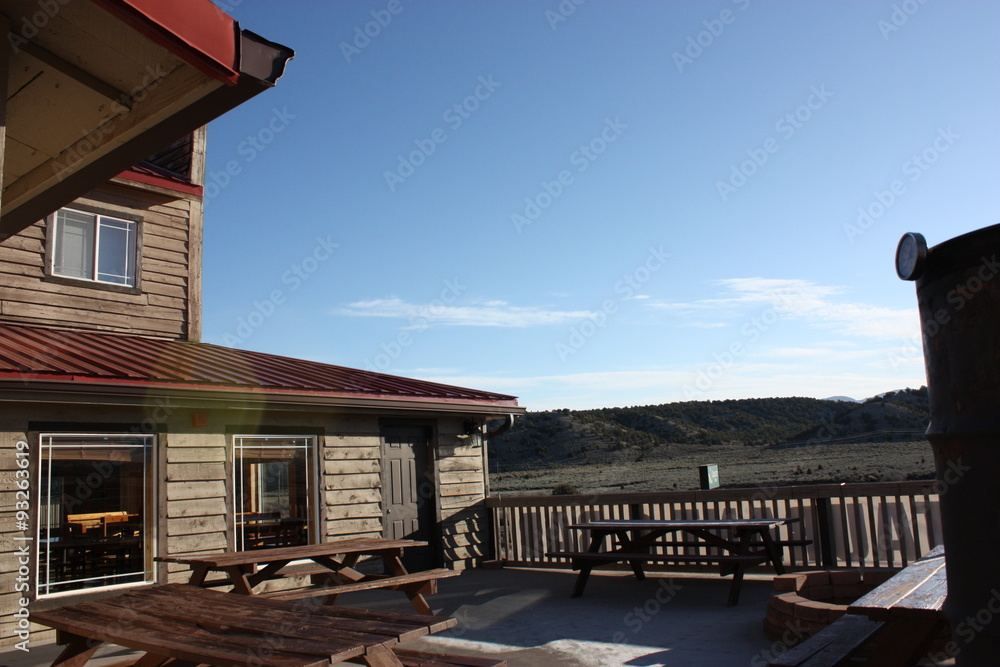 Obraz premium Wooden table on the terrace in the morning