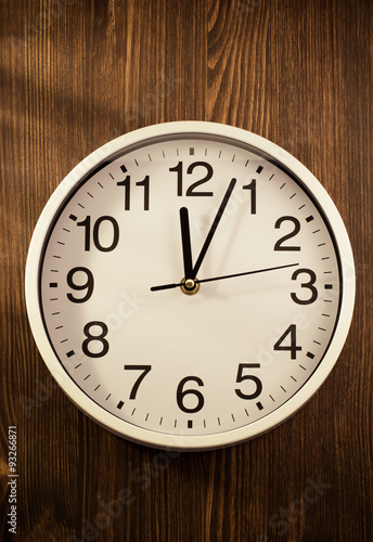 wall clock on wood