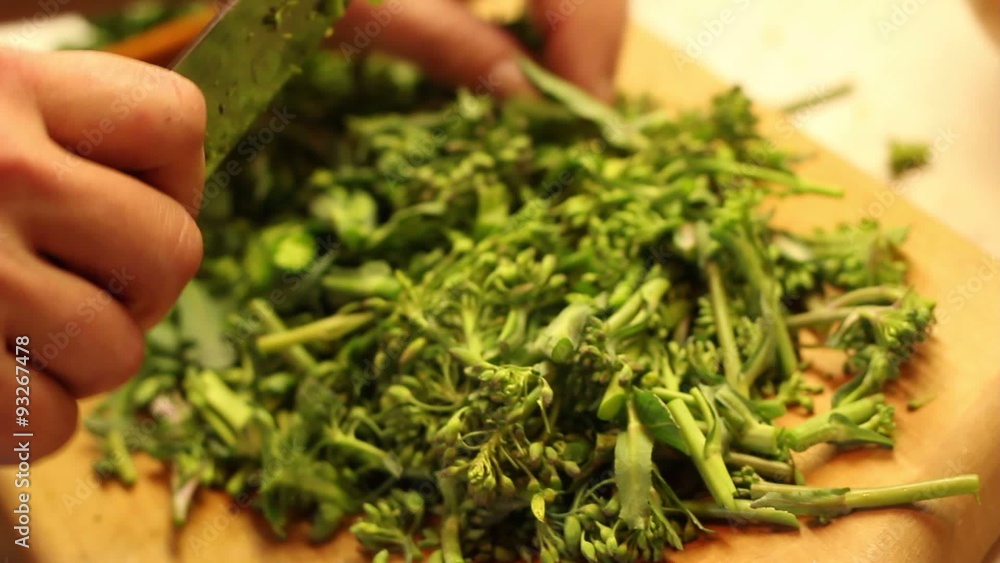 Cook preparing kale buds in the kitchen.mov Cook preparing kale buds in the kitchen.mov