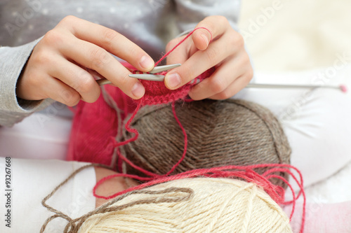 Little child learns to knit. Lifestyle - childhood