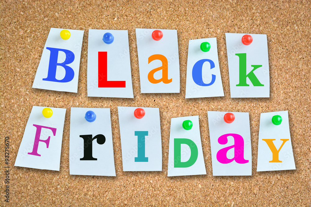 Black Friday sales text with wooden billboard and pins Black Friday sales text with wooden billboard and pins