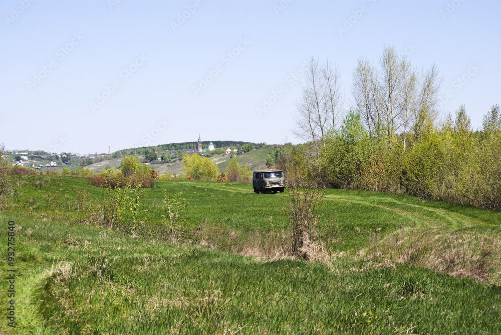 UAZ (Buhanka) travels along a country road in the vicinity of Ka
