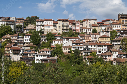 Town houses built on mountainside slope landscape © varbenov