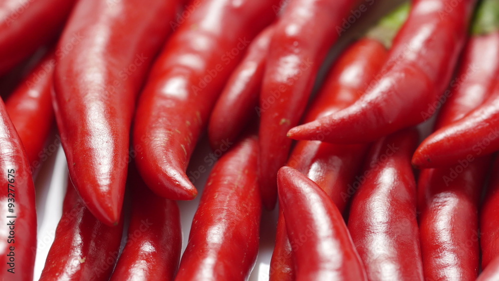 Red chili peppers closeup rotating. 4K UHD.
Red chili peppers closeup rotating. 4K UHD.