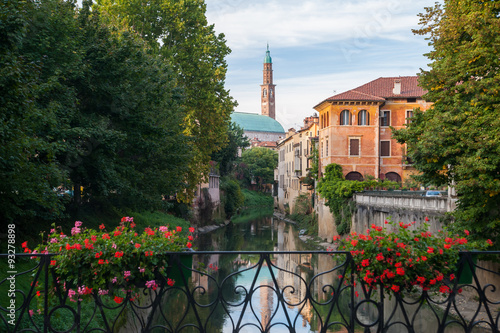 View of Retrone river and the clock tower of Vicenza, Italy, seen from Furo bridge photo