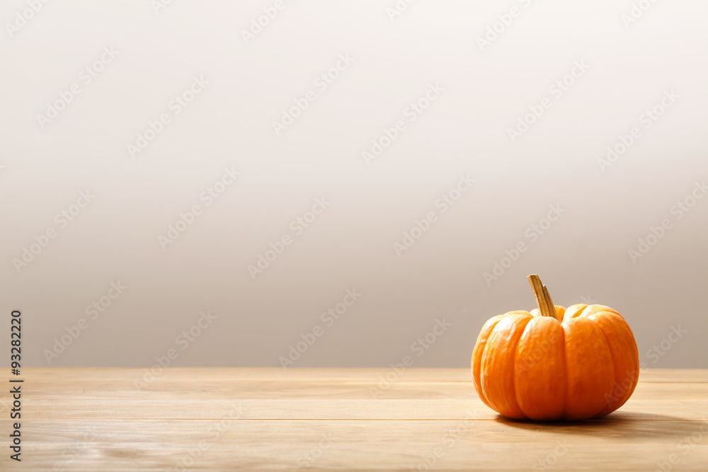 Autumn orange small pumpkin - obrazy, fototapety, plakaty 