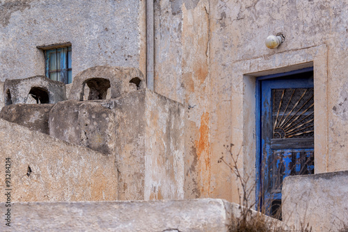 Old weathered door in Perissa, Santorini, Cyclades, Greece