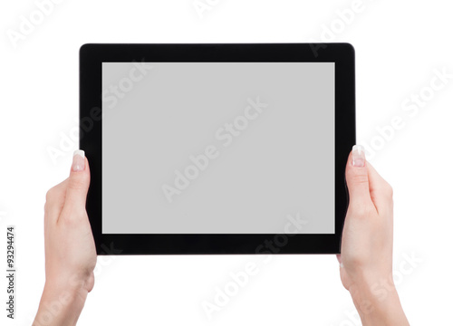 hands holding the tablet computer