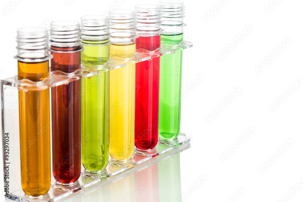 Test tubes with multi color chemicals isolated in white Test tubes with multi color chemicals isolated in white