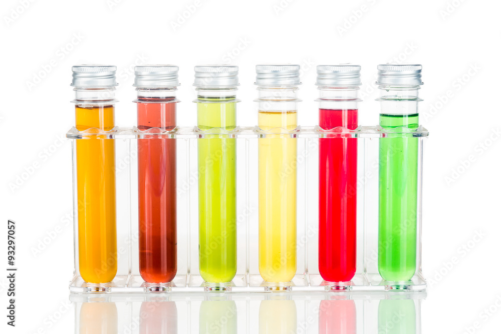 Test tubes with multi color chemicals isolated in white