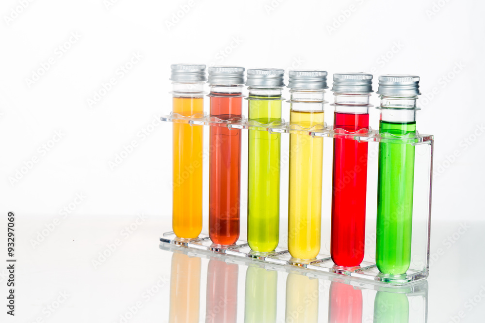 Test tubes with multi color chemicals isolated in white Test tubes with multi color chemicals isolated in white