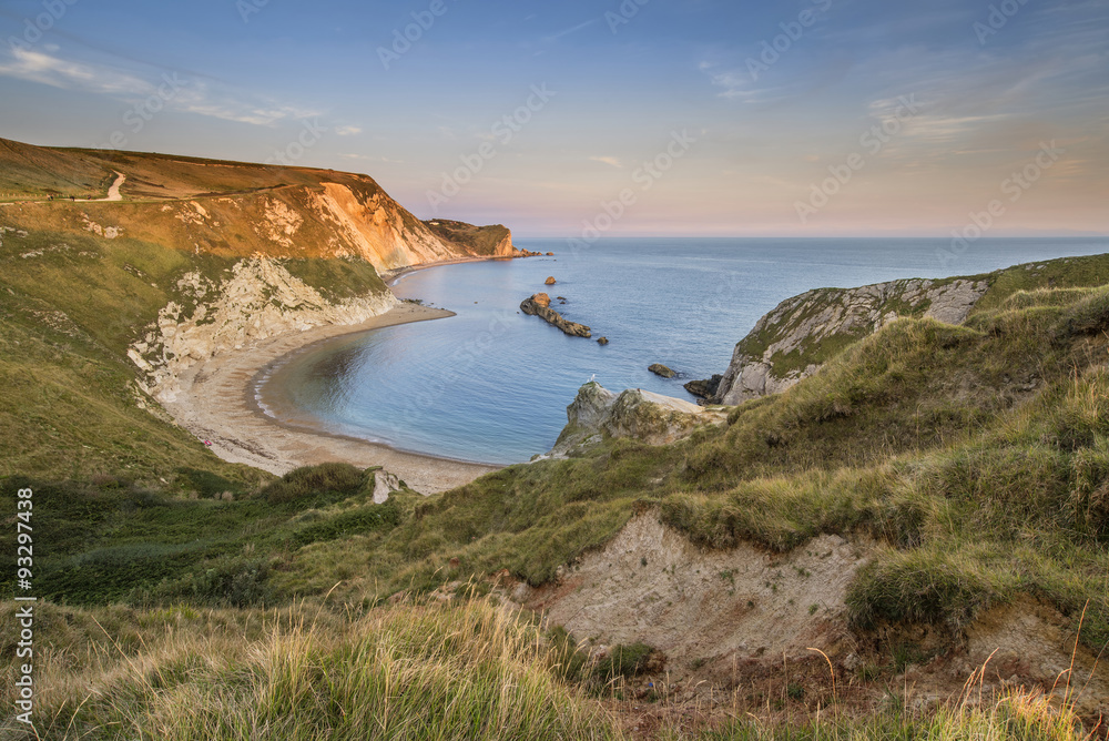 Stunning natural cove coastal landscape at sunset with beautiful