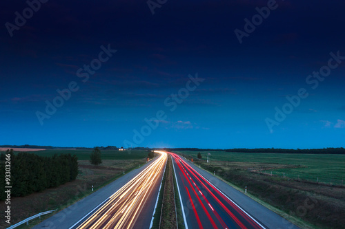 Cars speeding on a highway
