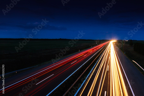 Cars speeding on a highway © Kavita