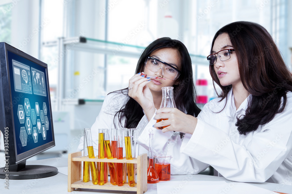 Two smart researchers doing experiment Two smart researchers doing experiment