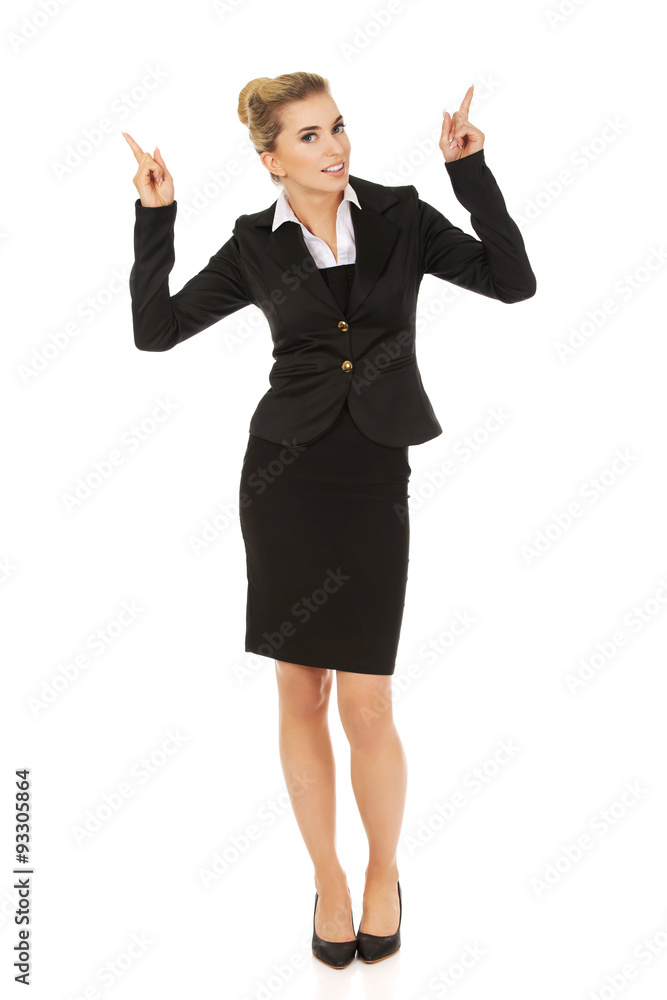 Young blonde businesswoman pointing on something Young blonde businesswoman pointing on something