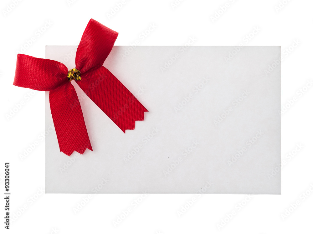 Shiny red ribbon with card isolated on white Shiny red ribbon with card isolated on white