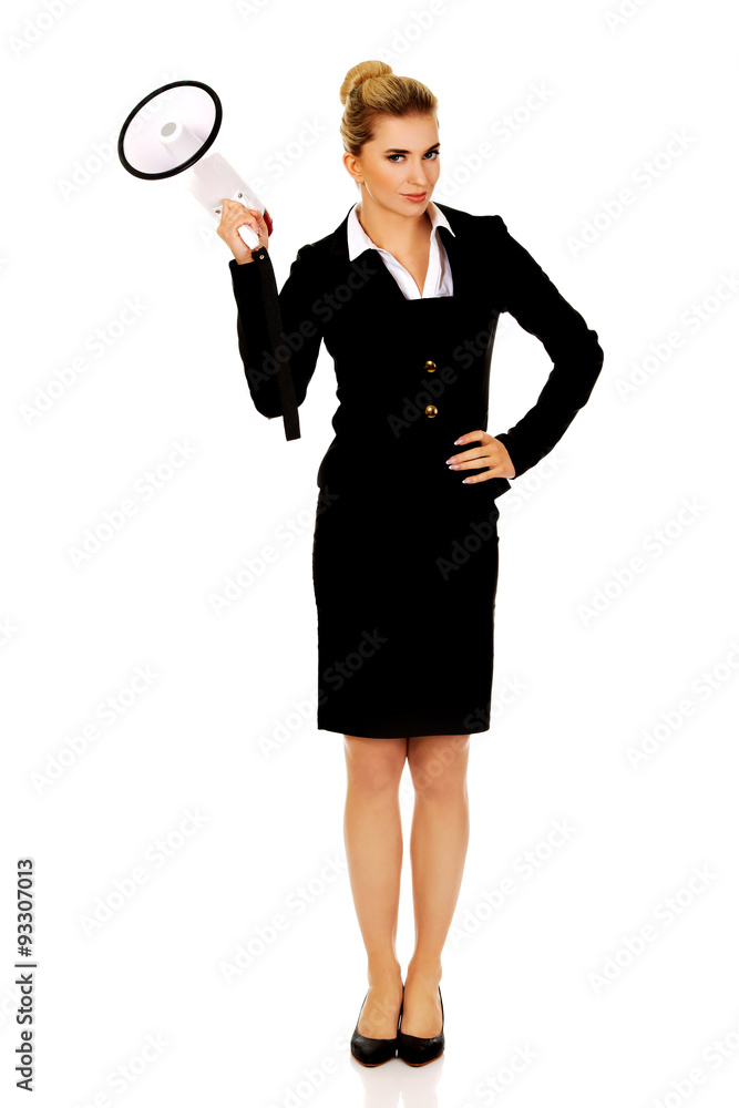 Beautiful businesswoman shouting with megaphone Beautiful businesswoman shouting with megaphone