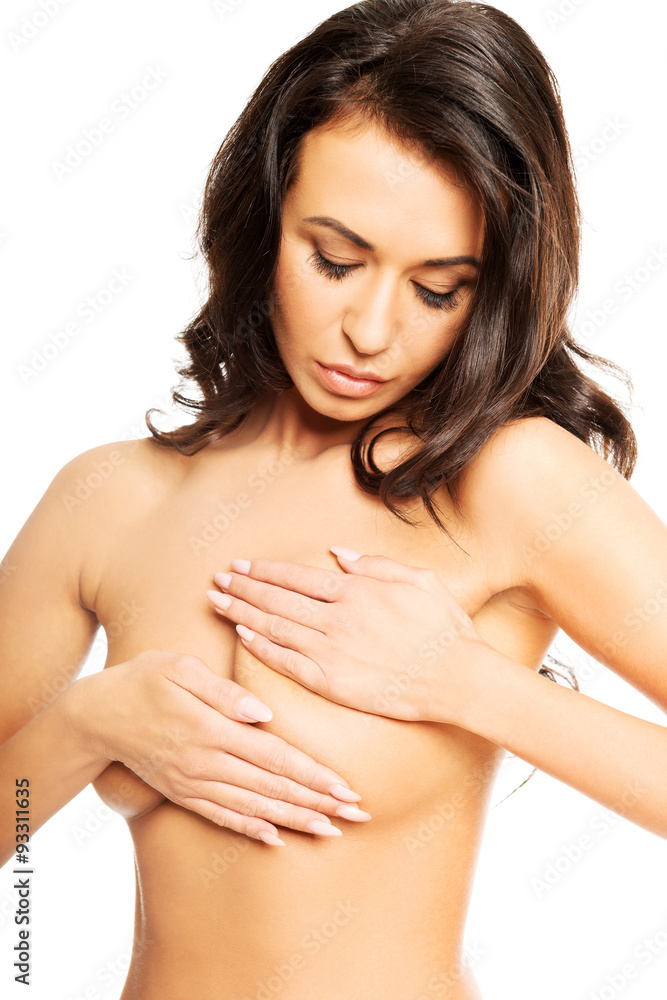 Beautiful topless woman examining her breast Beautiful topless woman examining her breast