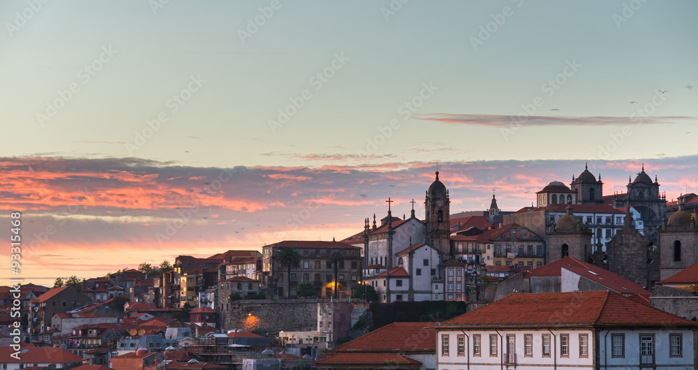 Porto city, Portugal October 17, 2013: Beautiful view of Old town of Porto in Portugal with nice sunset clouds