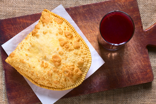 Photos Traditional Bolivian snack called Pastel (deep-fried pastry filled with cheese)