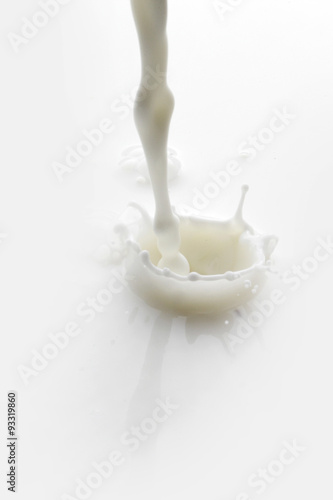 Pouring milk splash © yellowj