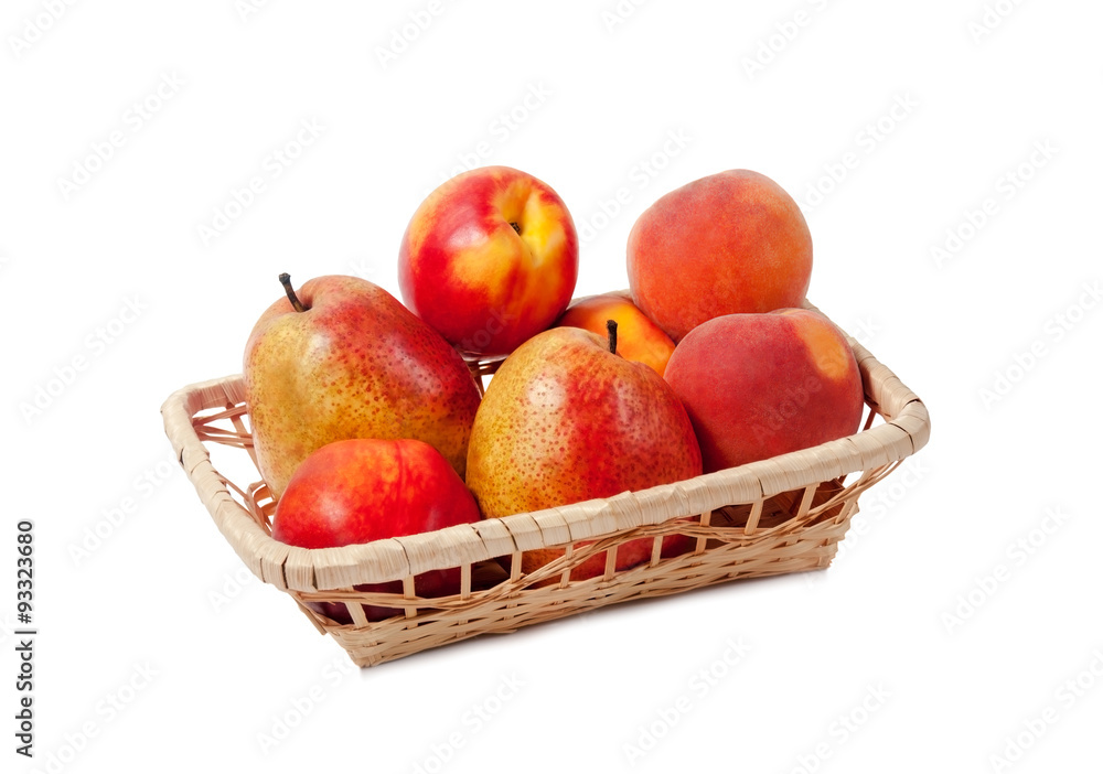 Fruits in a basket isolated on white background Fruits in a basket isolated on white background