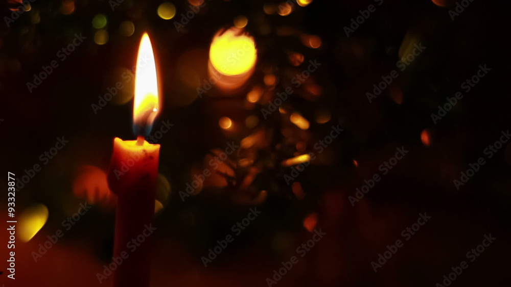 Candle lit in front of festive lights Christmas tree, Dolly shot
Candle lit in front of festive lights Christmas tree, Dolly shot