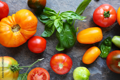 raw tomatoes and fresh basil