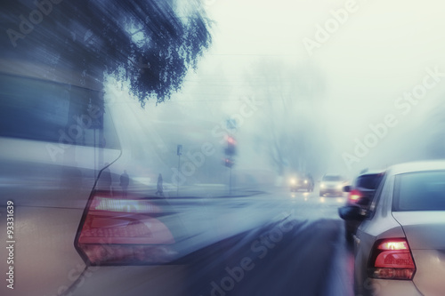 blurred background autumn fog on city road © kichigin19