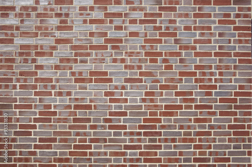 Hintergrundbild Backsteinmauer rot/violettgrau