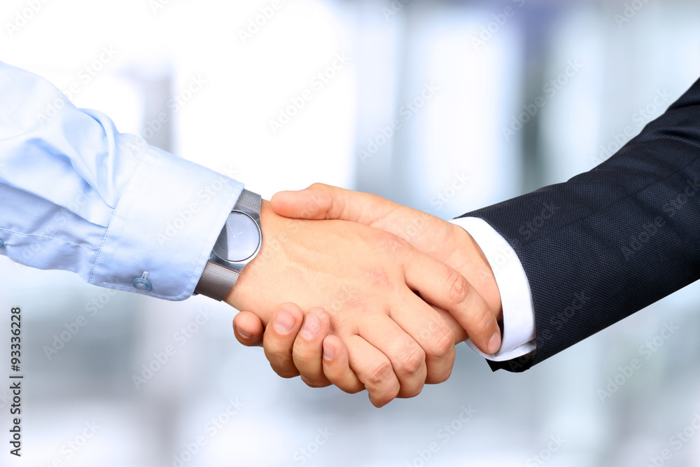 handshake between collegues handshake between collegues