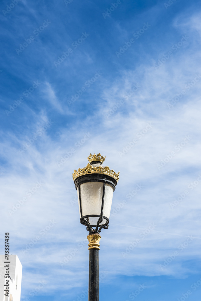 Black lamppost with golden ornaments