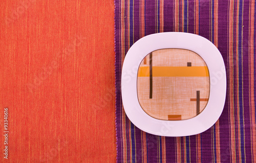 white plate on a colorful background
