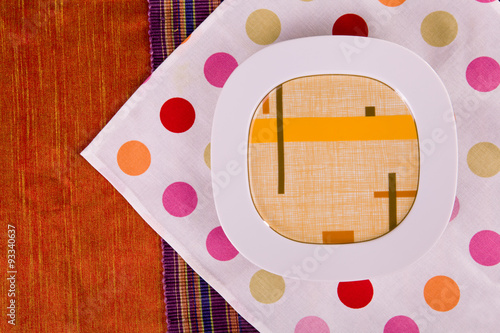 white plate on a colorful background