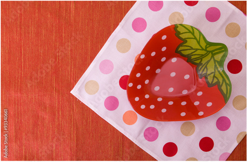 Children plate on a red background